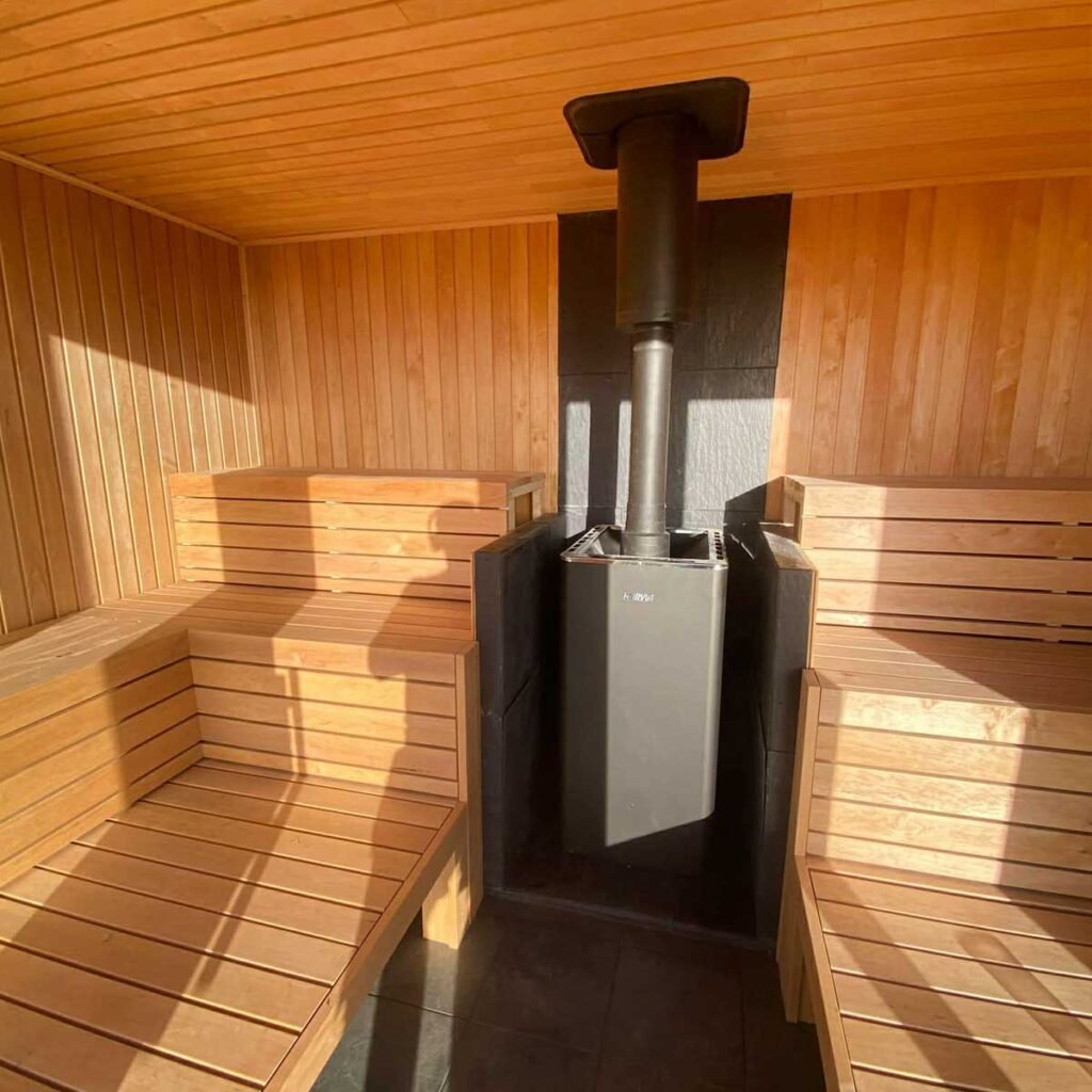 Completed custom sauna interior with wooden finish in countryside location near Bristol